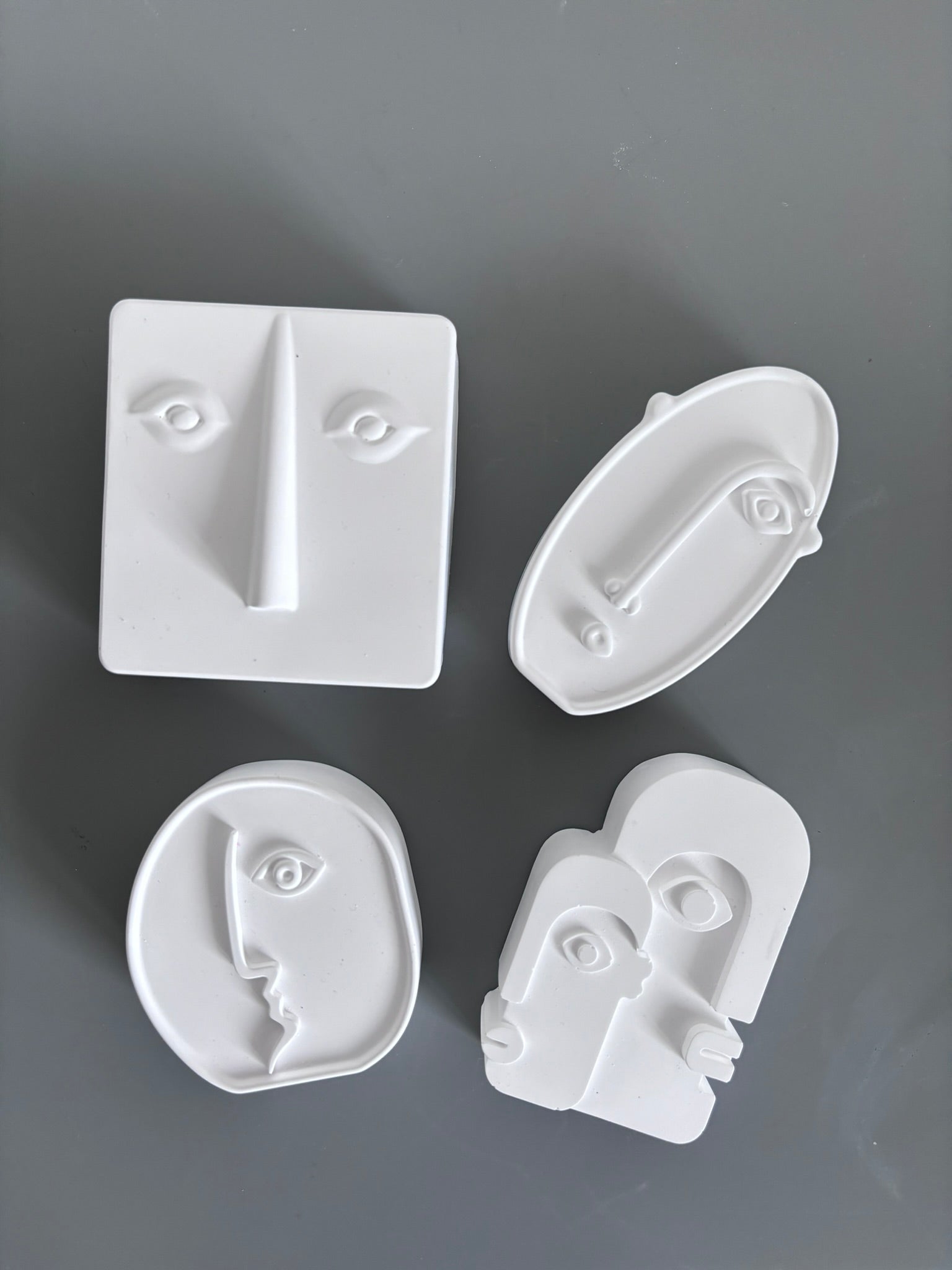 A Statement Set: Ceramic Face Sculptures
